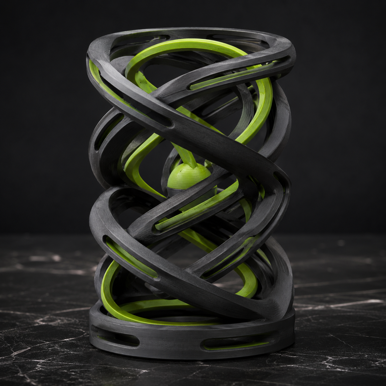 Interlocking charcoal and green 3D printed helix sculpture